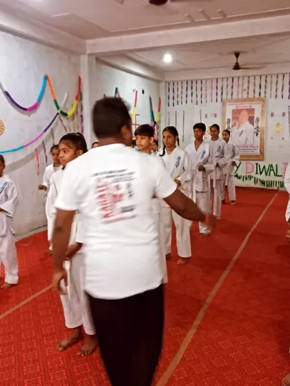 An instructor guides the students through their kihon sequence. Clear instruction is important, even during a test.