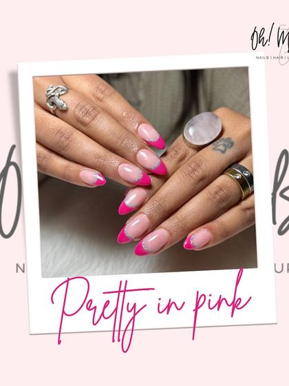 Pretty in pink. A classic French manicure gets a fun update with vibrant, hot pink tips for a bold and playful look.