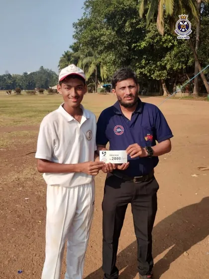 Scoring a match-winning hundred. Aaryan Desai receives his award on the field after scoring 108 runs for his school team in the Harris Shield tournament.