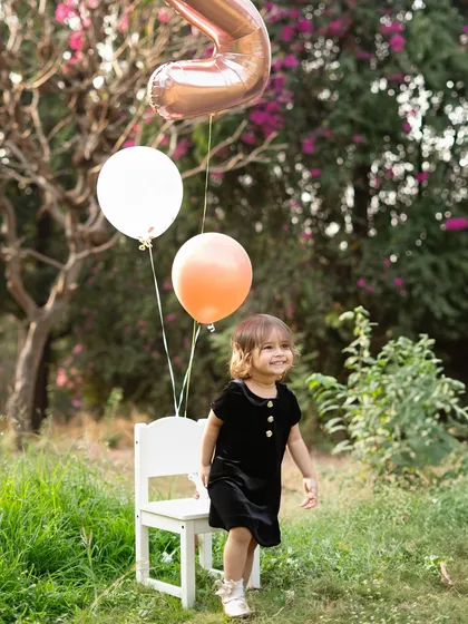 From a tiny newborn to a walking, exploring two-year-old. I love being there to capture these milestones. An outdoor session like this one lets your child's personality shine, creating natural and beautiful birthday portraits.