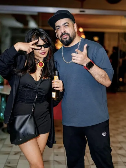 Posing with a guest at the Halloween party.