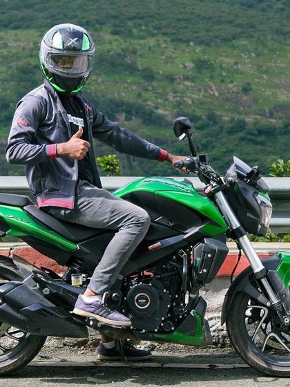 All smiles and a thumbs-up on a ride to Nandi Hills. It's one of our go-to spots for a quick morning ride and some great views.