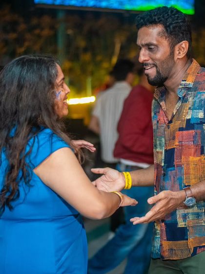 The joy of social dancing is written all over their faces. This is what it's all about, connecting with others through music.
