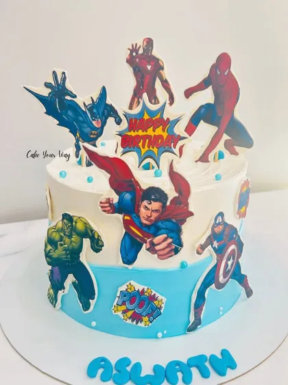 Saving the world one bite at a time with this superhero cake, featuring heroes from both Marvel and DC comics.