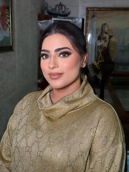 Another angle of this beautiful, simple look. The focus is on the eyes, with the rest of the makeup kept soft and natural.