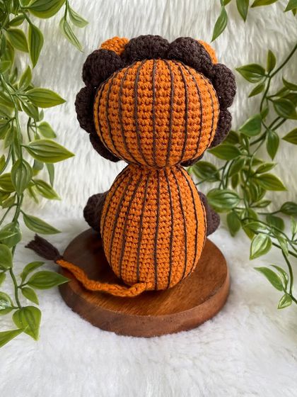 A unique lion created from a child's drawing! I love bringing your creative ideas to life. This striped lion with the initial 'M' is a truly one-of-a-kind creation.