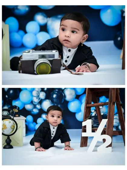 Two portraits from a half-birthday session, showing different angles and props. One shot features a vintage camera prop, while the other highlights the "1/2" sign, both capturing this baby's curious nature.
