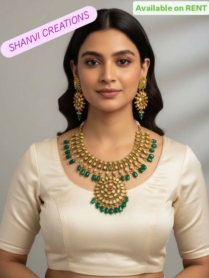 A simple yet elegant Kundan necklace with green bead drops. This versatile piece is perfect for a bride, bridesmaid, or a guest at any wedding function.