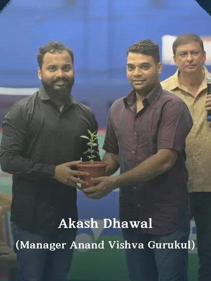 Mr. Akash Dhawal, a key venue manager, being honored for his support. I build strong relationships with venue staff to ensure seamless logistical coordination.