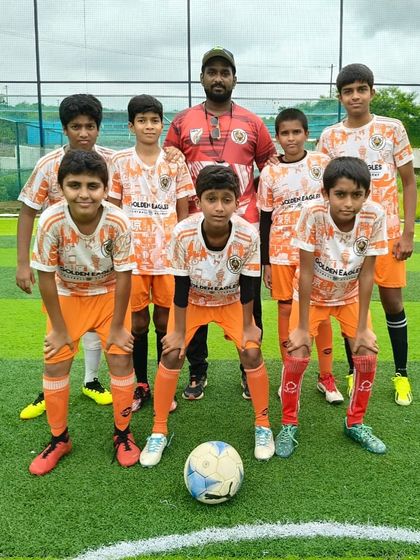 Our young pack of U12 players ready for their match. We build strong team bonds from an early age.