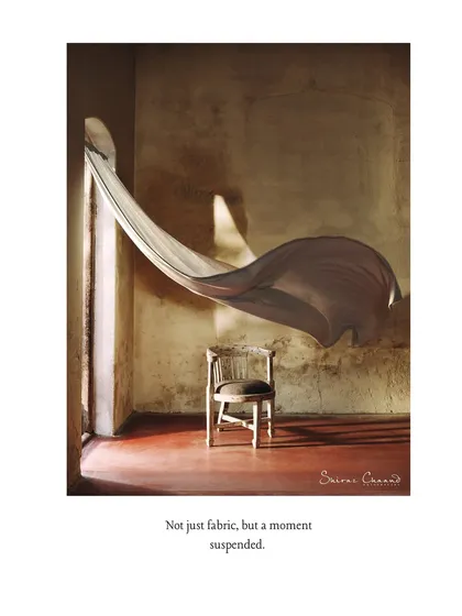 Sometimes the simplest concept is the most powerful. This image captures a single piece of fabric suspended in motion, transforming it from a simple textile into a moment of art. It represents my core philosophy: to stage emotion, not just present a product.