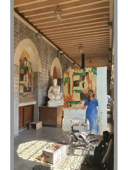 The studio setup for the large mural painting, showing the light coming in through the beautiful arched windows of the J.J. building.