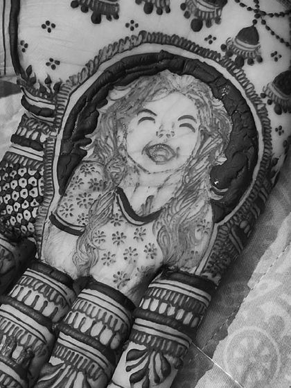 A close up in black and white of the laughing bride portrait. You can really see the emotion and detail I strive to capture in every one of my custom figures.