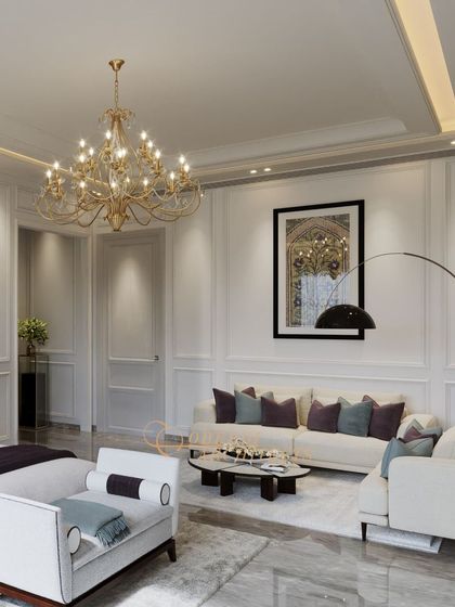 The lounge area within the bedroom is perfect for relaxation, featuring comfortable sofas and an elegant arc lamp.