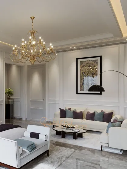 The spacious layout includes a full seating area with a sofa and an elegant arc lamp, making the bedroom a multi-functional living space.