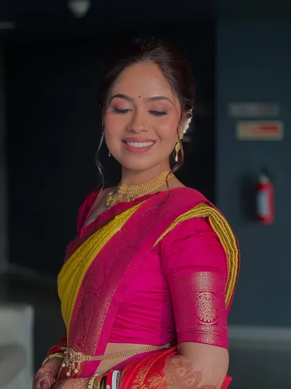 A close-up of the soft pink eyeshadow and glowing skin I created for this bride's traditional Maharashtrian look.