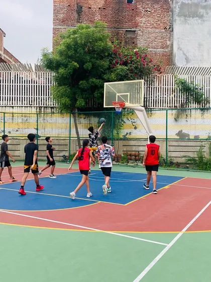 A player goes up for a layup.