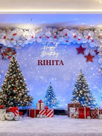 I also create elegant and seasonal themes like this "Winter ONE-derland" for a first birthday. The decor features a massive balloon arch with integrated lights and beautifully decorated Christmas trees for a magical, festive feel.