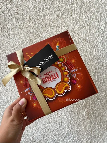We can even customize the packaging itself. This festive box for Angular Minds features their branding directly on the sleeve, creating a unique and personal touch for their Diwali gifts.