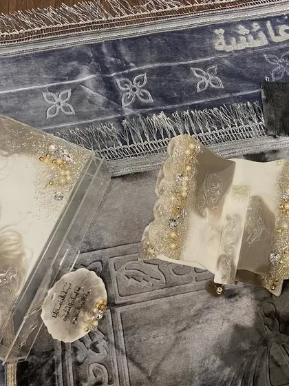 This video showcases the details of my silver-themed Islamic gift set. It includes a Quran holder and box with a beautiful silver and white resin pour, a crystal tasbeeh, car hanging, and a premium prayer mat.