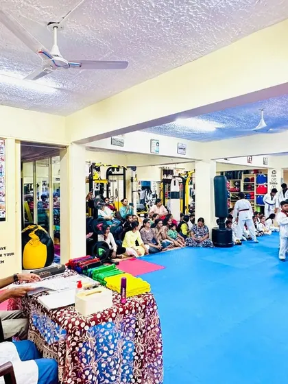 A view of the examination in progress, with parents watching from the side.