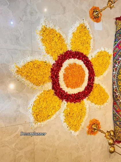 The heart of many traditional ceremonies is a beautiful flower rangoli. I carefully arrange each petal by hand to create these intricate designs, bringing color, fragrance, and blessings to the floor of your home.