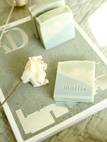 The 'Minty Breeze' bar, styled with a dried rose, highlighting its natural elegance.