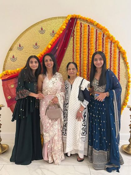 A beautiful family moment featuring one of my clients in an elegant sequin and thread-work saree. It's an honor to dress you for the occasions that matter most, surrounded by your loved ones.