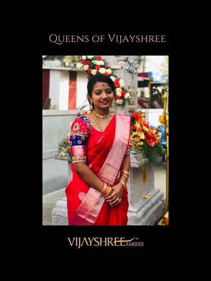 Manasa Gowda celebrating in a vibrant red Kanjivaram, showcasing how a classic saree can be styled for festive temple visits.