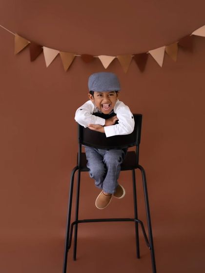 A moment of pure, uninhibited laughter. My goal is to make photoshoots fun for kids, so we can capture their true joyful spirit.