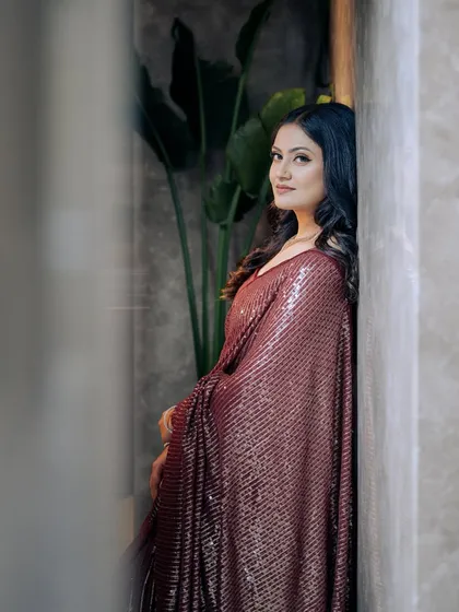 A beautiful, soft-focus shot that captures the elegance of the bride's engagement look.