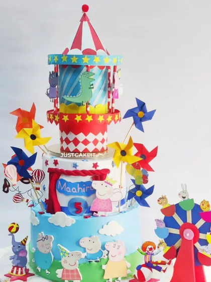 Another view of the Peppa Pig carnival cake, showcasing the Ferris wheel and other fun, edible details.