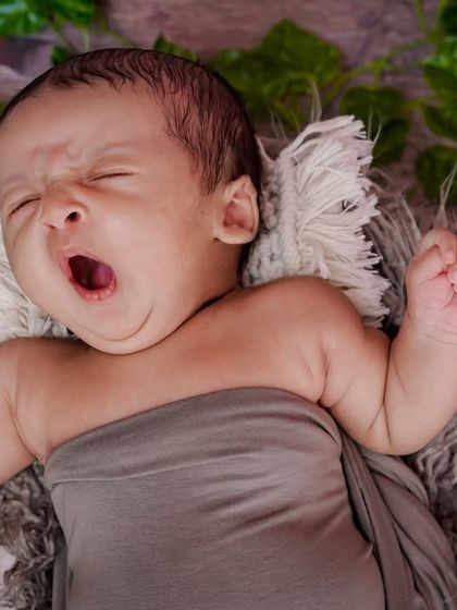 A big yawn and a big stretch. These are the real, unposed moments that I love to capture. It shows so much of their tiny personality.