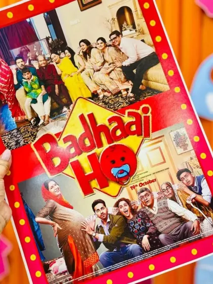 A fun, personalized prop for a filmy-themed baby shower. We created a custom movie poster of 'Badhaai Ho' featuring the family's own pictures, adding a humorous and personal touch.
