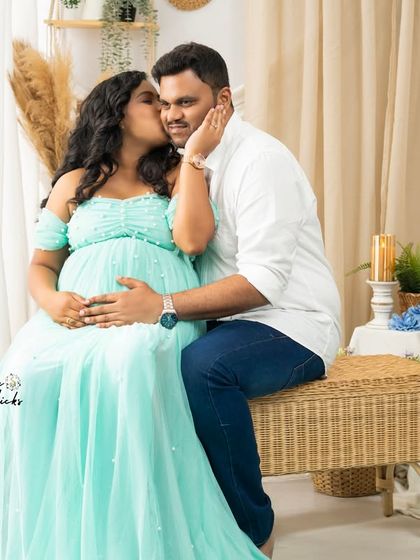 A playful and affectionate moment, with a kiss on the cheek showing the fun and loving dynamic of the couple.