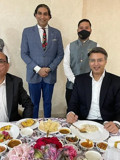 My team and I with the leadership of Amity, enjoying a meal we catered. It is a pleasure to share our food with clients who have become like family.