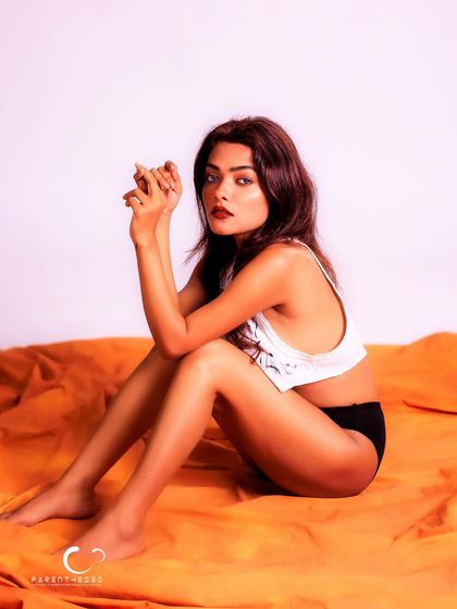 A more pensive and vulnerable pose. This portrait showcases a softer side, proving that intimacy can be both strong and gentle.