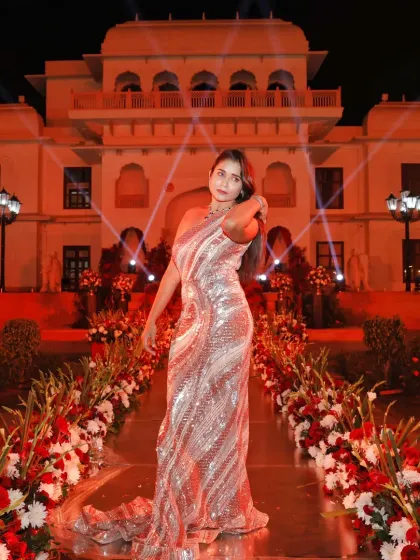 Another stunning shot from the grand wedding at Shiv Vilas. The dramatic lighting and floral arrangements created a truly royal path for the couple.