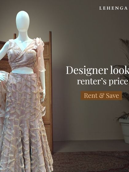 Designer looks at a renter's price. This dusty pink gown with a ruffled dupatta and intricate embroidery offers a unique and romantic silhouette for a sangeet or reception.