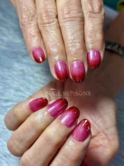 A bold red glitter ombre for a glamorous look.