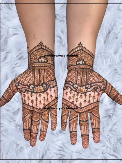 A traditional design featuring elephants on the wrist and a lotus motif on the palm. The combination of these auspicious symbols is perfect for a bride.