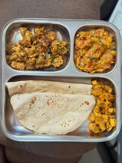 A protein-packed meal of chapati, egg bhurji, brinjal bharta, and pan-fried paneer.