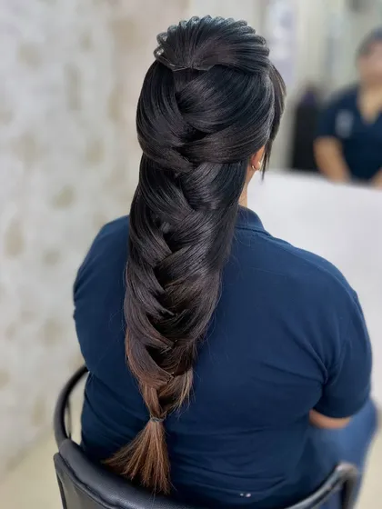 The final result of a perfectly executed mermaid braid with a slight ombre effect at the tips.