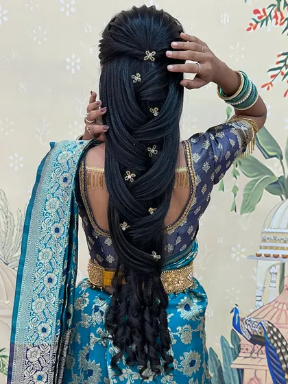 Hairstyling is a key part of our diploma. This intricate mermaid braid, decorated with small accessories, is one of the many advanced, trending styles you will master in my course.