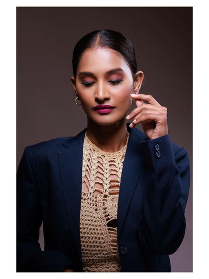 A contemplative pose with eyes closed, adding an artistic and serene touch to the series.