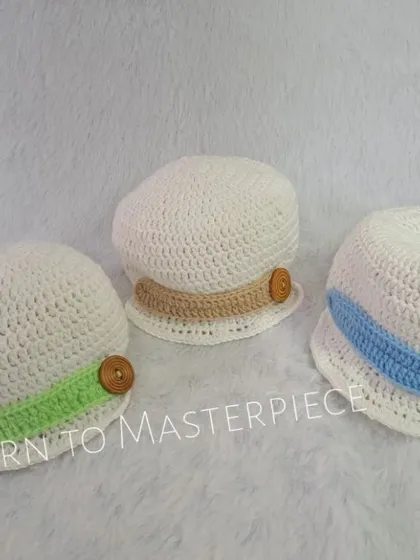 I offer my newsboy caps in a variety of accent colors. Here you can see the cap in white with green, beige, and blue bands.