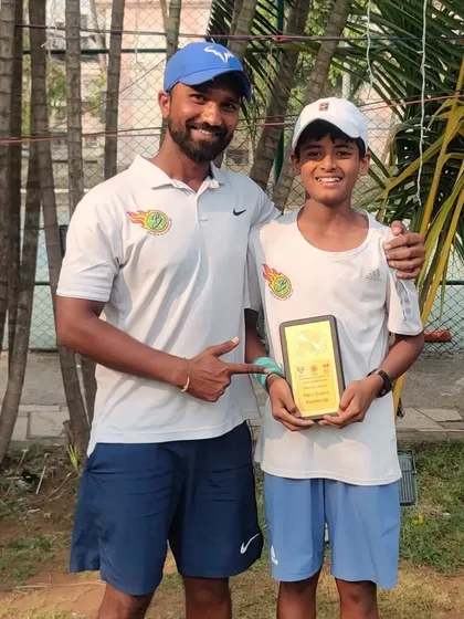 Rishikesh Mane celebrating a Doubles win and Singles runner-up finish at the Super Series event in Chennai. This shows great versatility and endurance.