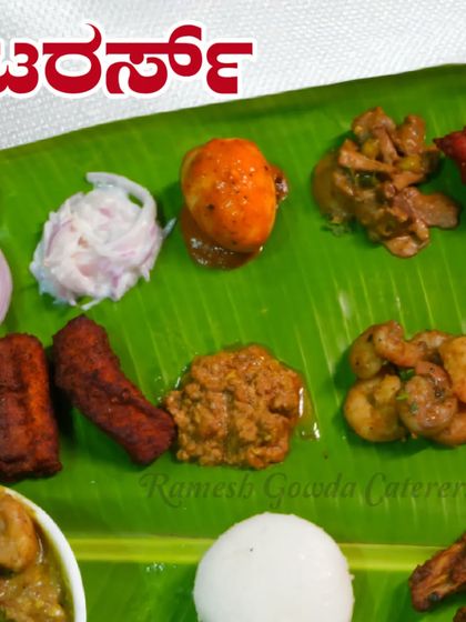 An assortment of our non-veg specialties on a banana leaf. You can see prawn fry, fish fry, mutton curry, and egg masala, showcasing the variety we offer.