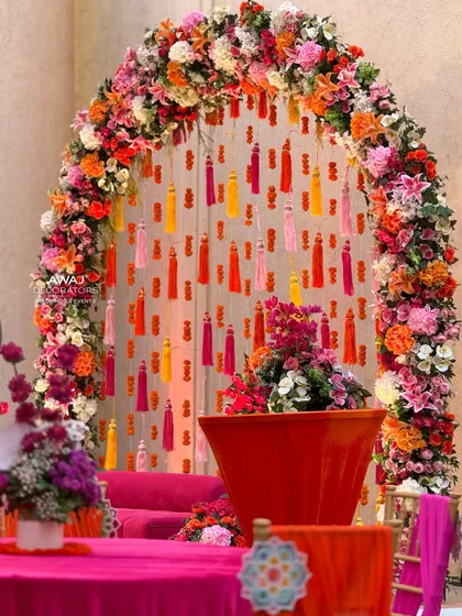 The floral arch in all its glory, a perfect backdrop for the bride during her Mehendi ceremony.