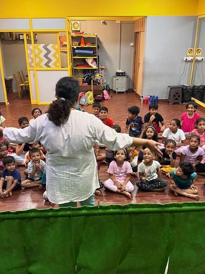 Engaging with the audience during a summer camp show. I love asking questions and getting the kids to participate in the storytelling.